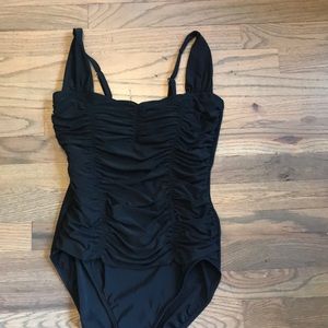 Black ruched one piece built in underwire. M
